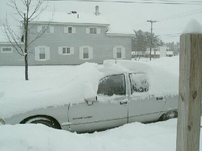 A REVERSE MOHEGAN ON THE CAR SHOWS ABOUT 12 " SNOWFALL